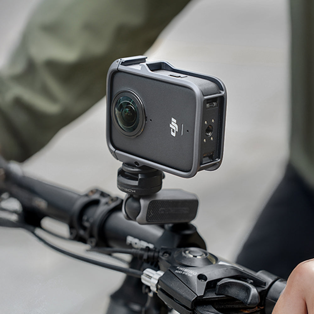 The Camera Cage For Dji Osmo 360​ features a Side 1/4"-20 Threaded Socket​ that securely mounts your camera horizontally, providing a stable, low-center-of-gravity platform for capturing immersive footage while cycling or surfing.