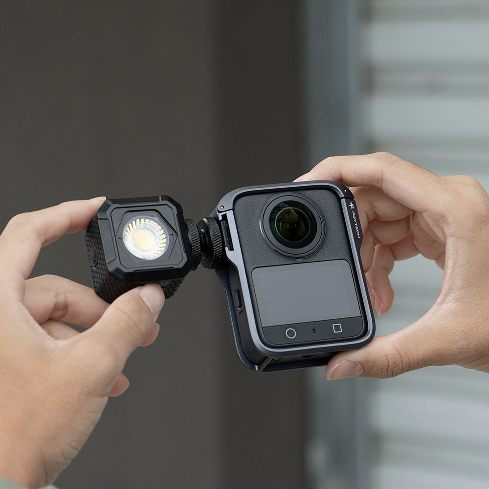 Enhance your 360-degree videos with audio and lighting by connecting additional gear to the Side Cold Shoe Mount​ included with the Camera Cage For Dji Osmo 360.