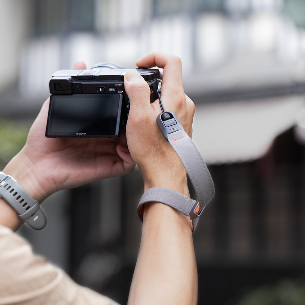 Camera Wrist Strap Air: Hidden magnetic clasp, turns into bracelet with easy wrist wrapping.