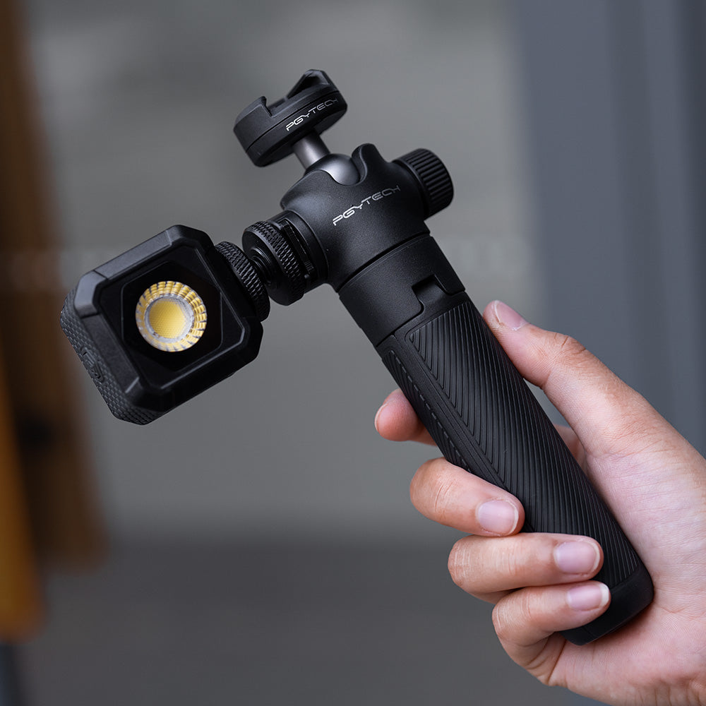 the CapLock Action Camera Extension Pole Tripod is featured with a  cold shoe mount on the side can which can attach  light, mic or other accessories