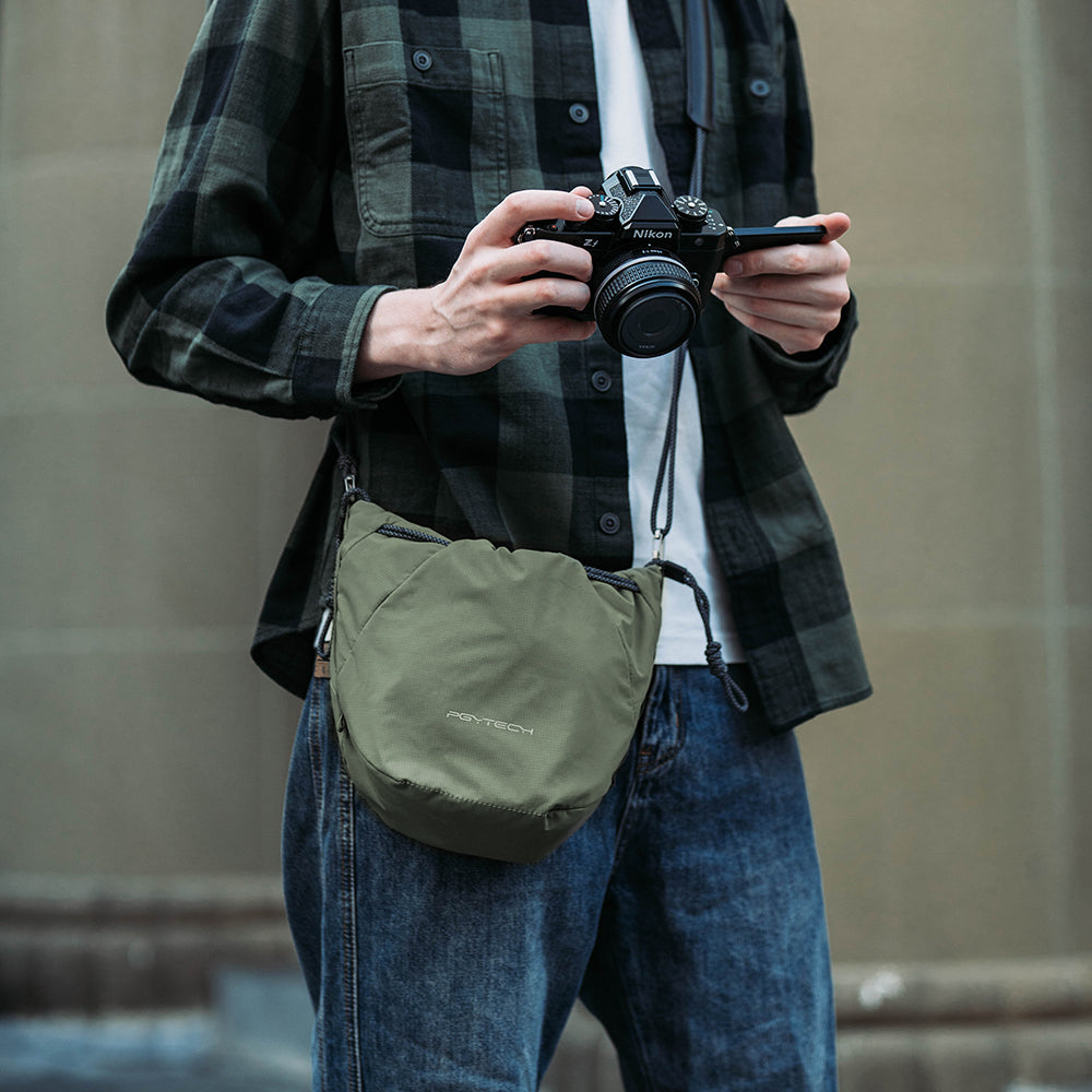 Use OneGo Drawstring Bag to carry your camera safely.