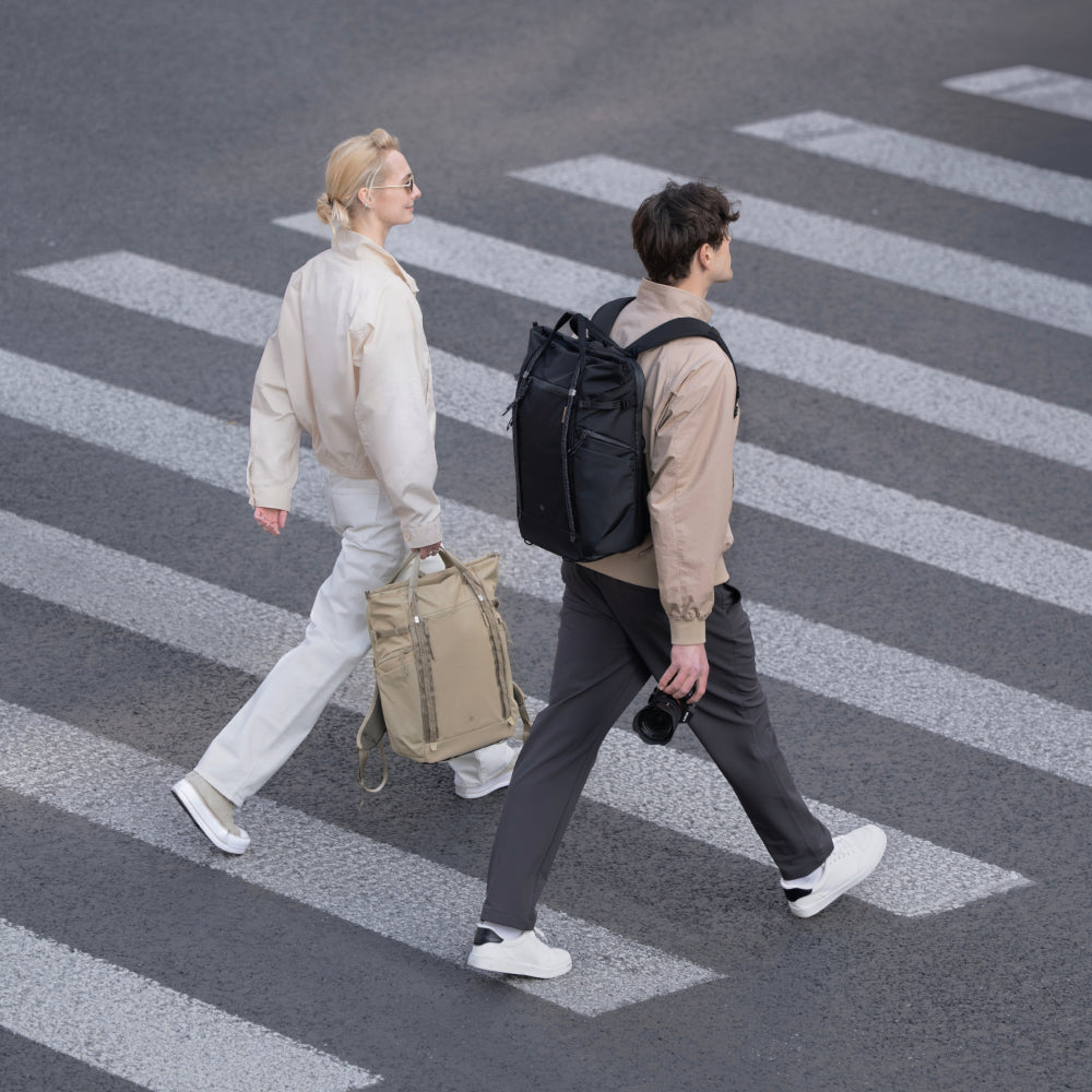 The OneGo Roamer Tote Backpack fits urban street scenes for stylish photography shooting.