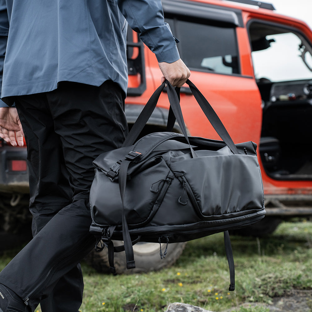 The OneMo Travel Backpack in the handheld mode