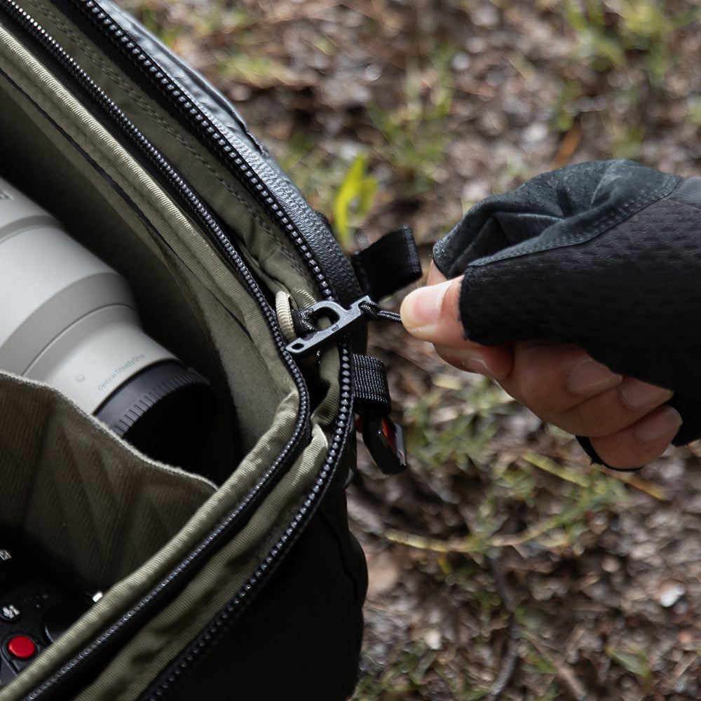 The OnePro Flex Backpack has a buckles and straps integration to ensure secure locking