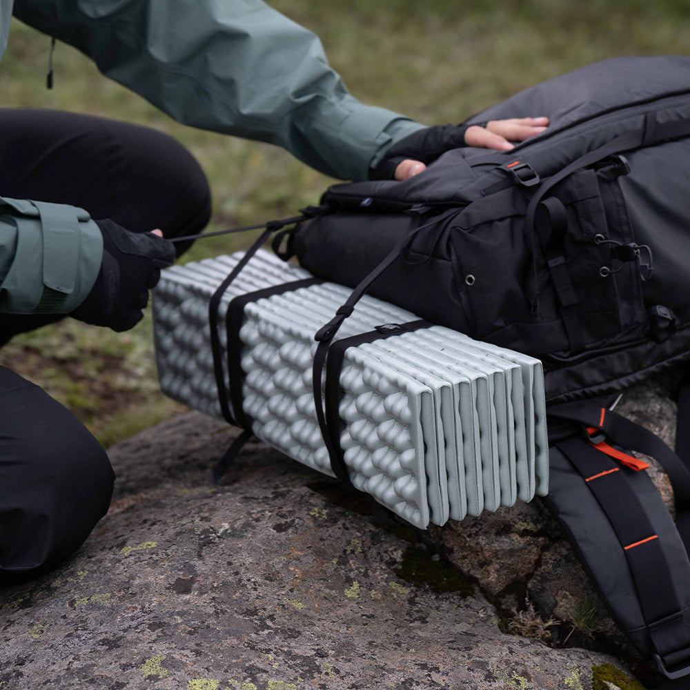 Bottom of the OnePro Flex Backpack can securea ground mat/drone landing pad
