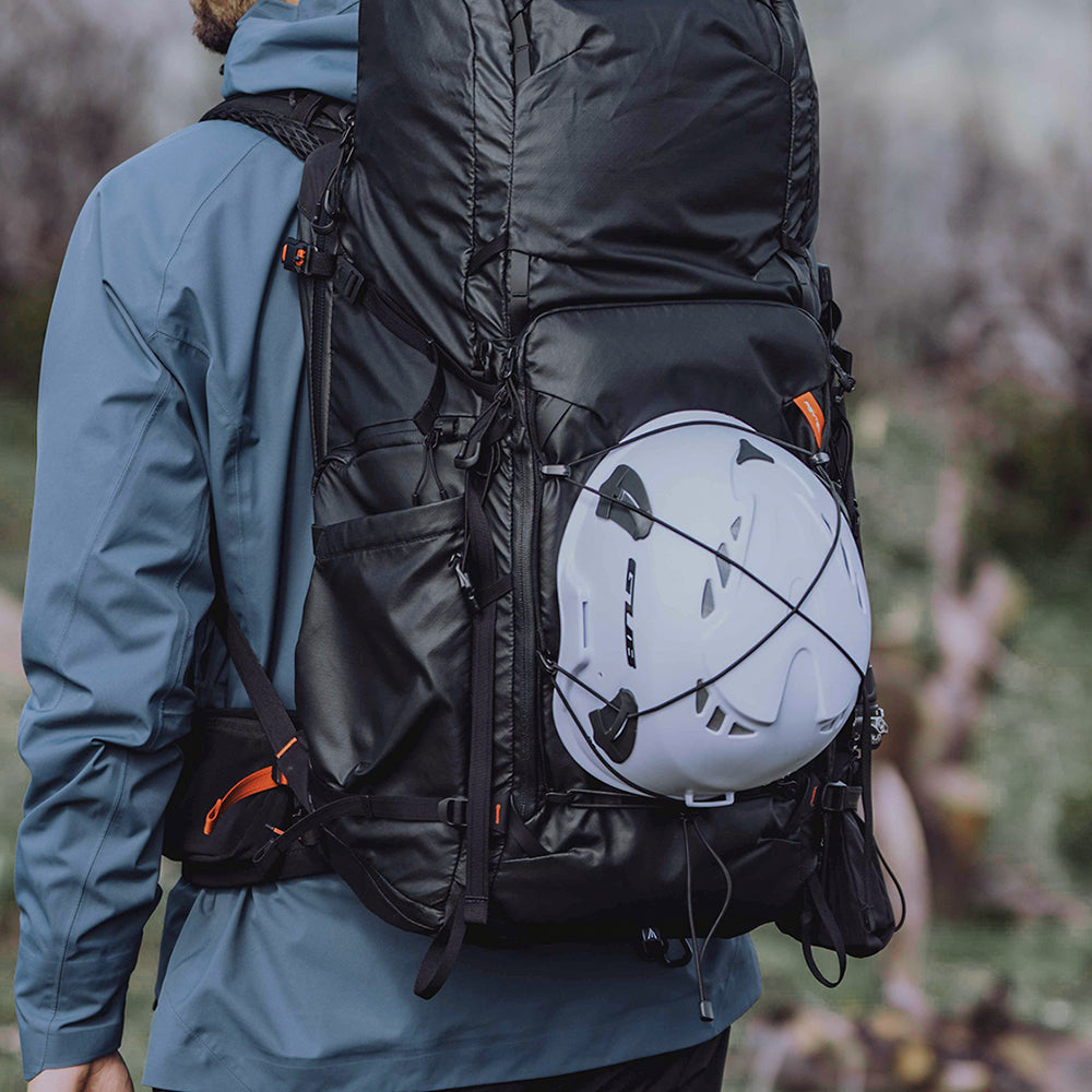 The OnePro Flex Backpack has a mesh front pocket for helmet or thin clothes