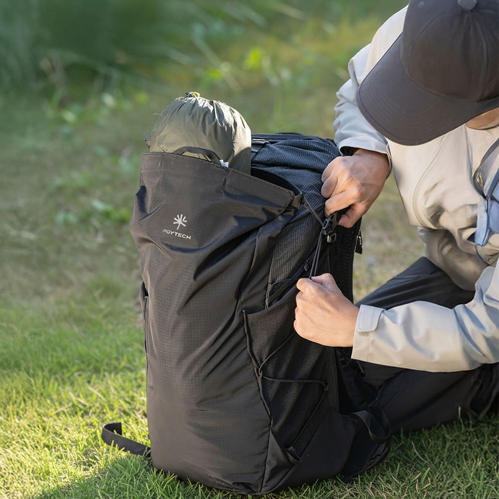 The front expansion compartment of the OnePro Ultralight Backpack features a flexible dual-use design for adapting to any adventure