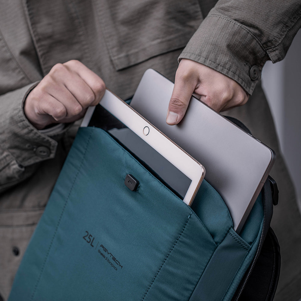 Easily slip your iPad in and out​ of the dedicated back compartment of the OneMo 2 Backpack